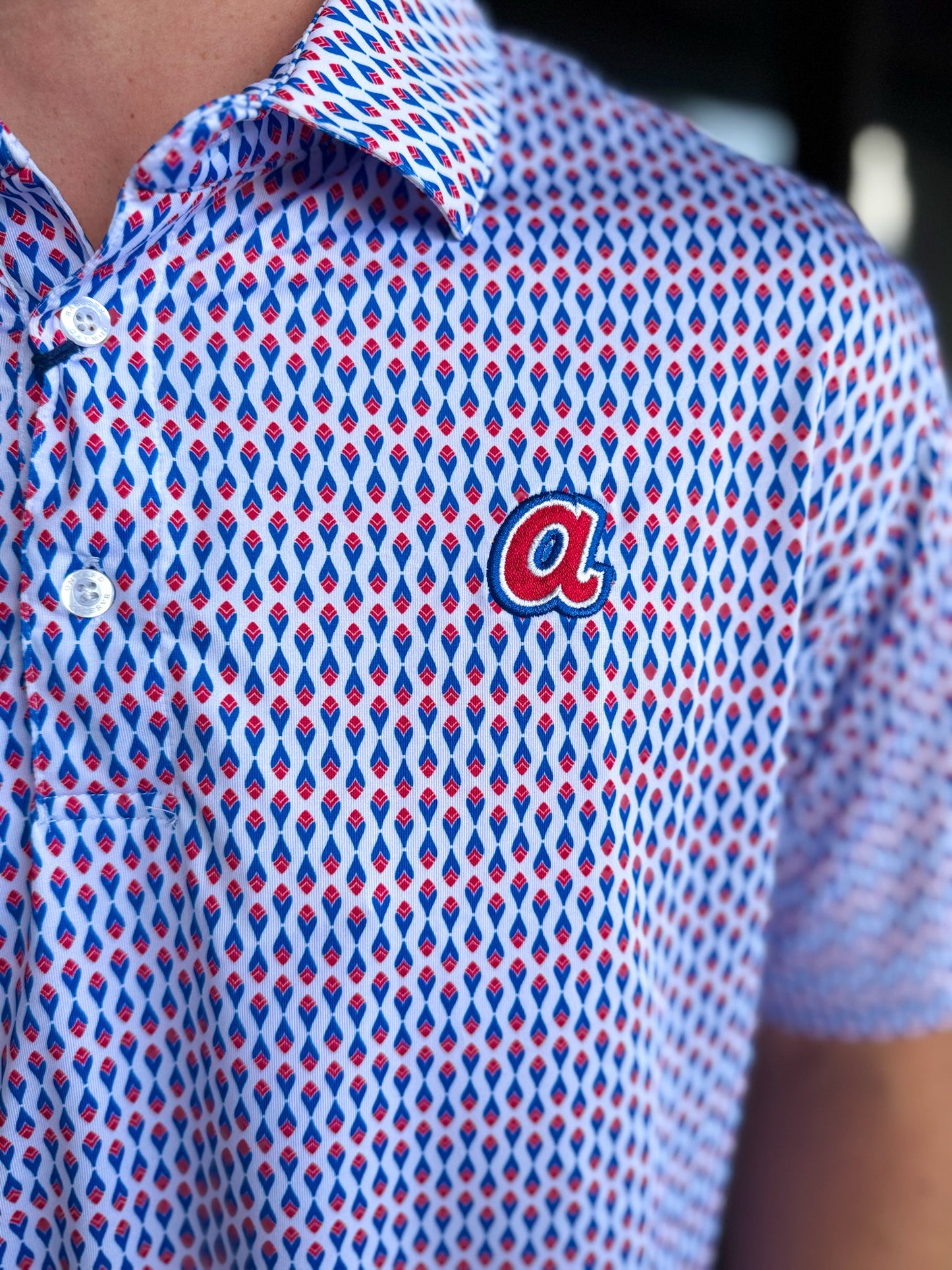 Atlanta Braves Cooperstown Feather Printed Performance Polo