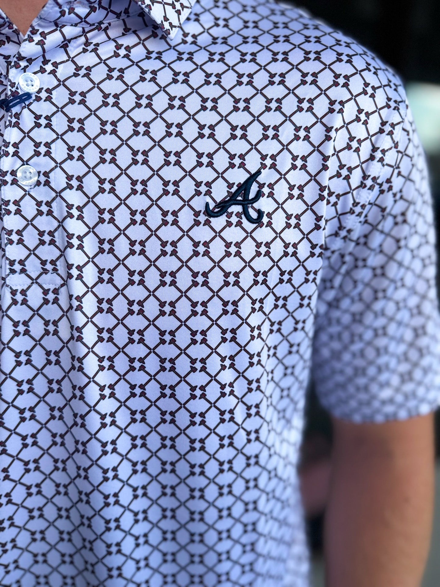 Atlanta Braves Tomahawk Printed Performance Polo